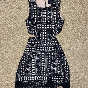 Nicole Miller black lace romper with open back